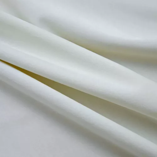 2 db krémszínű bársony sötétítőfüggöny gyűrűkkel 140 x 175 cm