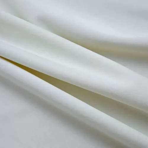 2 db krémszínű bársony sötétítőfüggöny gyűrűkkel 140 x 225 cm