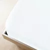 Fehér pamutdzsörzé gumis lepedő 140 x 200 cm