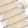 10 db krémszínű, félkör alakú lépcsőszőnyegek, nagy méretben, 65 x 21 x 4 cm