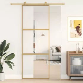   Aranyszínű átlátszó ESG üveg és alumínium tolóajtó 76 x 205 cm