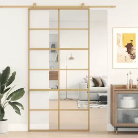   Aranyszínű átlátszó ESG üveg és alumínium tolóajtó 102,5x205 cm
