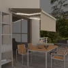 Krémszínű LED-es kézzel kihúzható napellenző redőnnyel 3x2,5 m