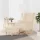 Krémszínű szövet karosszék hintalábakkal és lábtartóval
