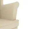 Krémszínű szövet fotel lábzsámollyal