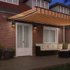 Behúzható napellenző sárga és narancssárga 500 × 300 cm szövet