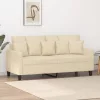 Kétszemélyes krémszínű szövetkanapé 140 cm