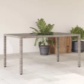 Szürke polyrattan üveglapos kerti asztal 150 x 90 x 75 cm