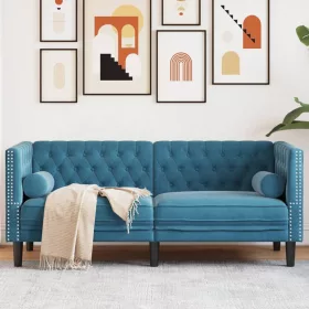   2 személyes kék bársony Chesterfield kanapé hengerpárnákkal