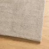HUARTE homokszínű rövid szálú puha és mosható szőnyeg 80x200 cm