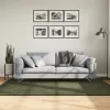 HUARTE erdőzöld rövid szálú puha és mosható szőnyeg 140x200 cm