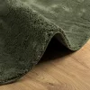 HUARTE erdőzöld rövid szálú puha és mosható szőnyeg Ø 120 cm