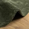 HUARTE erdőzöld rövid szálú puha és mosható szőnyeg Ø 160 cm