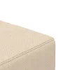 Kétszemélyes krémszínű szövet kanapéágy két párnával