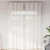 2 db fehér fátyolfüggönyök rojtokkal