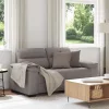 Kétszemélyes fekete szövetkanapé 120 cm