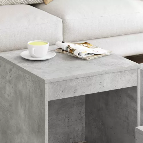 3 db betonszürke szerelt fa egymásba tolható asztal